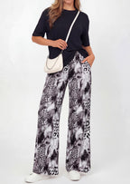 PRETTYGARDEN Women's 2 Piece Lounge Sets Summer Casual Short Sleeve Tops Leopard Flowy Pants Pajamas Vacation Travel Outfits